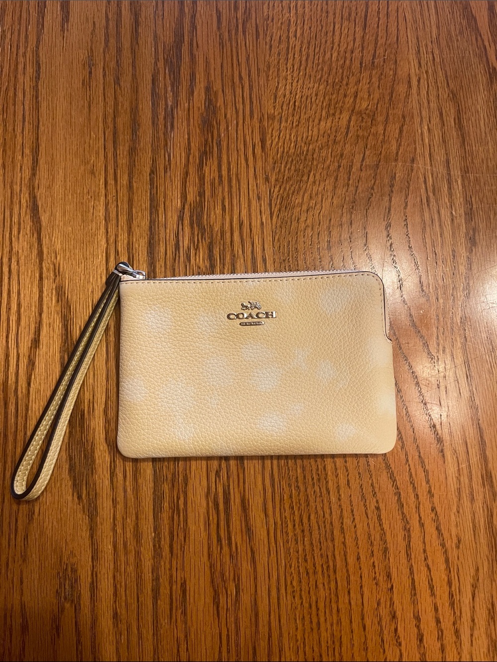Coach Cream Pebbled Leather Wristlet with Gold Logo